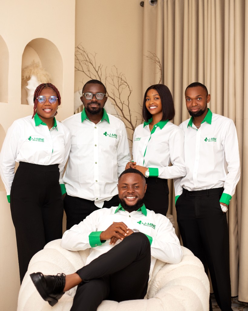 J-MINE staff in branded shirts at the Port Harcourt office